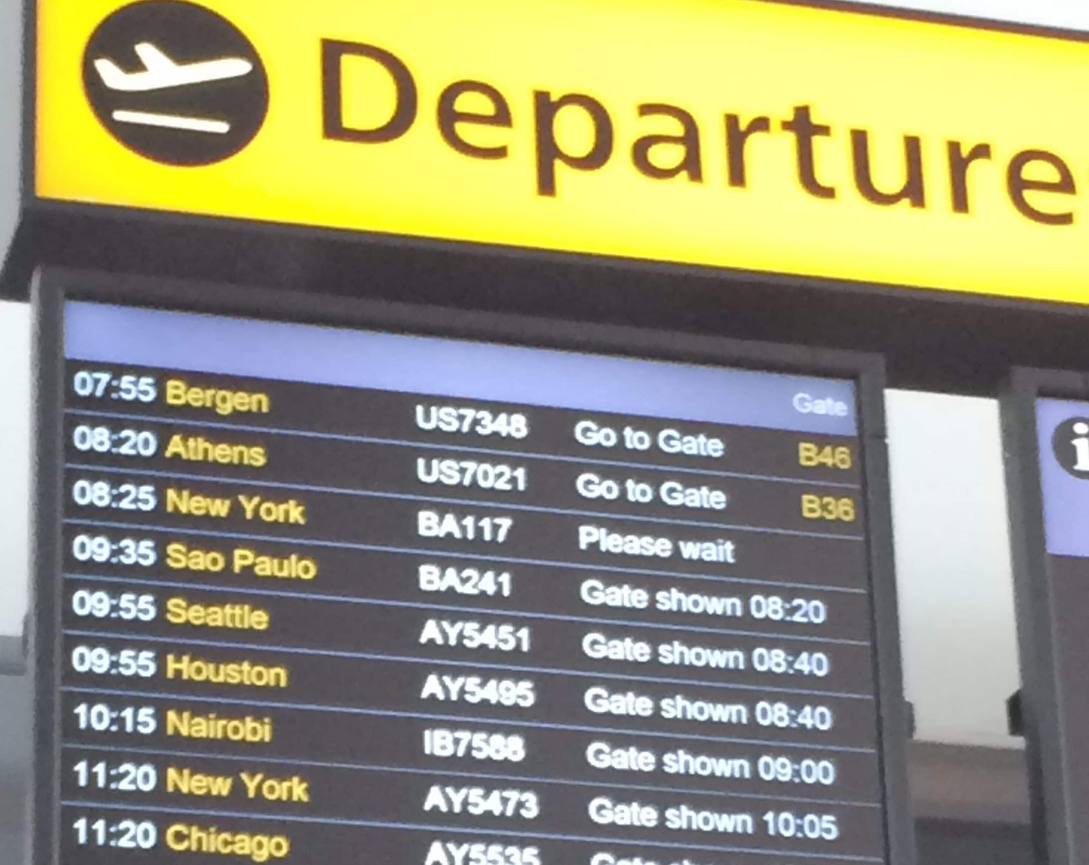 Flight departures board at Heathrow Airport
